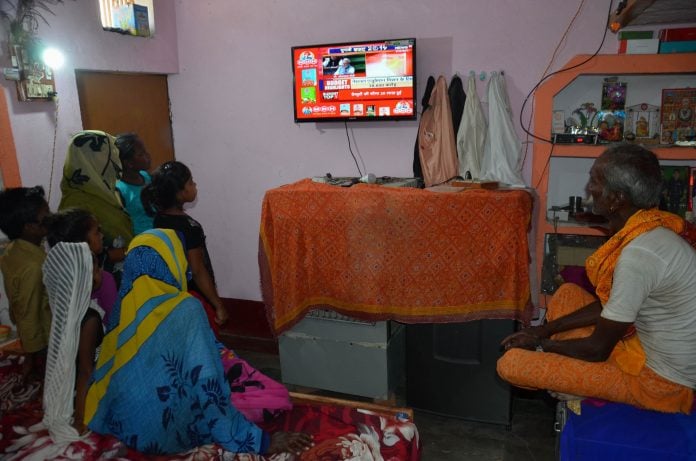 Family Watching TV UNI (2)